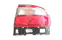 Фонарь задний для Toyota Carina E седан '92-97 правый (TYC) внешний, бело-красный