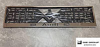 Рамка номерного знака с надписью и логотипом "Audi "