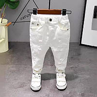 Стильні рвані білі джинси для діток