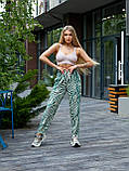 М'ятні літні лляні жіночі штани в спортивному стилі на гумці з етнічним принтом, фото 3