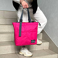 Женская розовая сумка-шоппер с плечевым ремнем.
