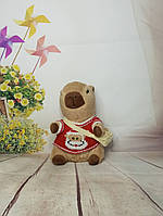 М'яка іграшка Капібара у світері червоний з сантою 23 см тренд Тік-Тока. Водосвинка