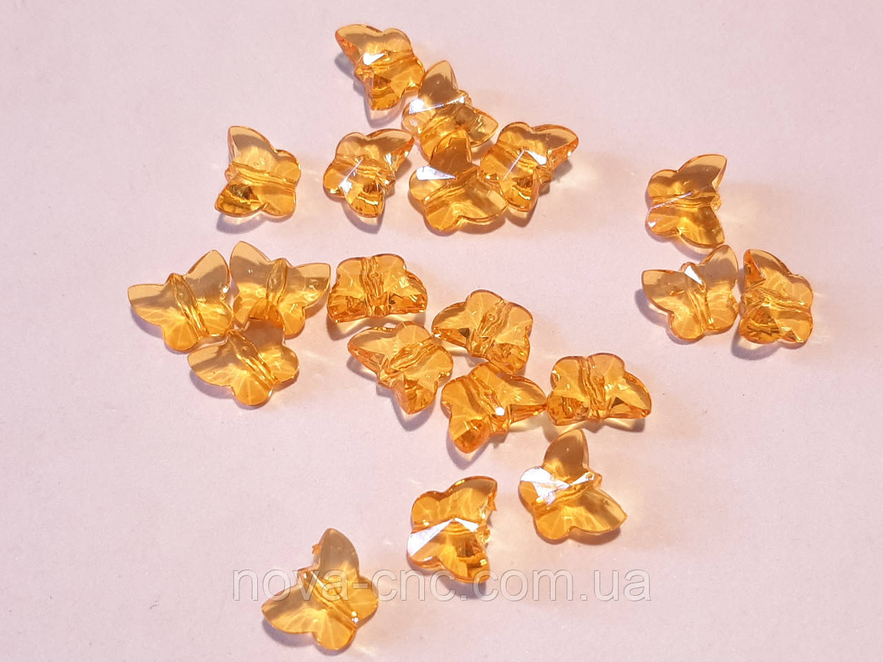 Намистини "Метелики" помаранчевий акрил 12 мм 500 грам