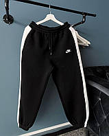 Мужские спортивные штаны Найк черные с белыми вставками на манжете Nike Toyvoo Чоловічі спортивні штани найк