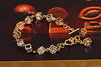 Браслет Xuping Jewelry кубики с камнями в середине 18 см 9 мм золотистый