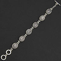 Браслет жіночий сріблястого кольору з місячними камінцями та візерунками застібка тогл довжина 22 см ширина 11 мм