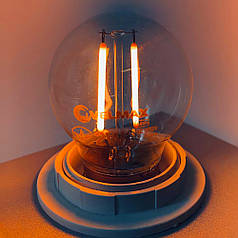 LED лампа Velmax V-FILAMENT-G45 2W E27 помаранчева 21-41-35