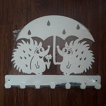 Ключниця настінна металева біла 28*21 см на 7 гачків їжаки