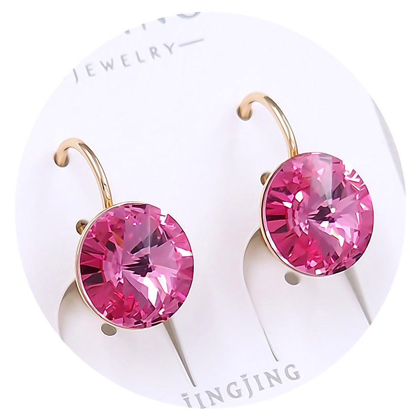 Сережки XР. Позолота 18К. Камені: Swarovski рожевого кольору. Довжина: 18 мм. Ширина: 11 мм.
