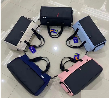 Сумка спортивна дорожня 50*30 см на блискавці з довгим ремінцем із різних варіантів Inna