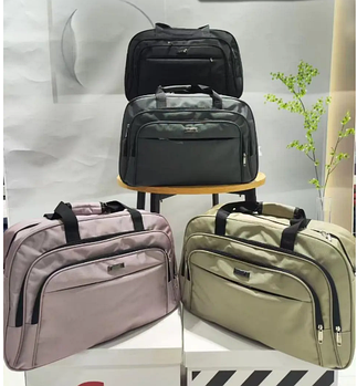 Сумка спортивна дорожня 58*37 см на блискавці з довгим ремінцем із різних варіантів Inna