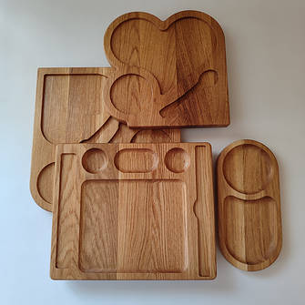 Фігурні дерев'яні тарілки, таці, дошки сервірування стола