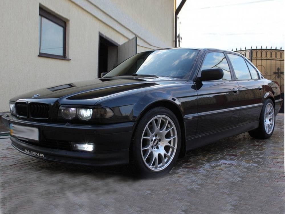 Вії на фари БМВ 7 E38 (2 шт. під фарбування) Накладки на фари для BMW 7 E38 "Прямі"
