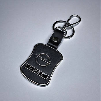Брелок з логотипом авто Opel, карабін та кільце, металевий зі вставками натуральної шкіри.