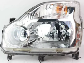 Фара ліва Nissan X-Trail T31 08-10 (H4) TYC ел., с корект., без ламп, з кришкою
