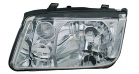 Фара ліва Volkswagen Bora 99-05 (H4/H3) TYC мех./ел.