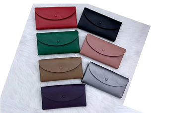 Гаманець жіночий 19*9 см на кнопці зі штучної шкіри у різних кольорах Kabir