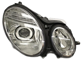 Фара права Mercedes 211 (E-Class) 06-09 (H7/H7) TYC ел., с кор., з кришкою