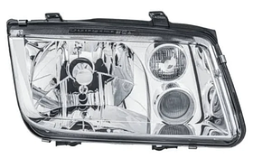 Фара права Volkswagen Bora 99-05 H4/H3 TYC мех./ел., с п/туф