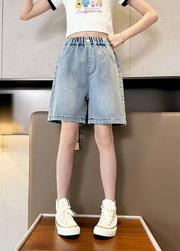 Модні джинсові шорти для дівчинки підлітка