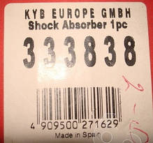 Амортизатор передній лівий газомаслянный KYB Ford Fiesta 5, Mazda 2 (04-08) 333384, фото 6