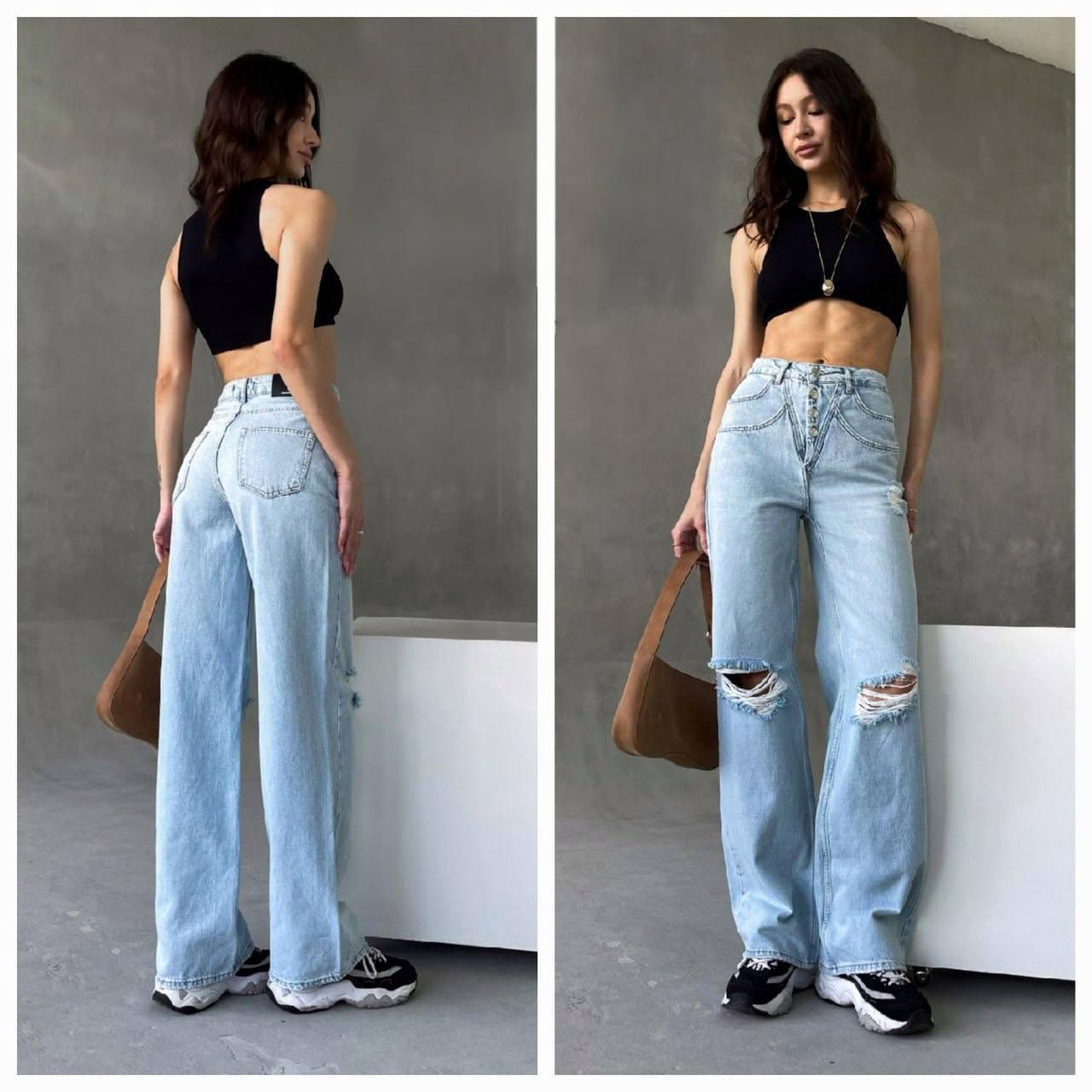 Жіночі вільного крою джинси з рваними колінами, фото 1