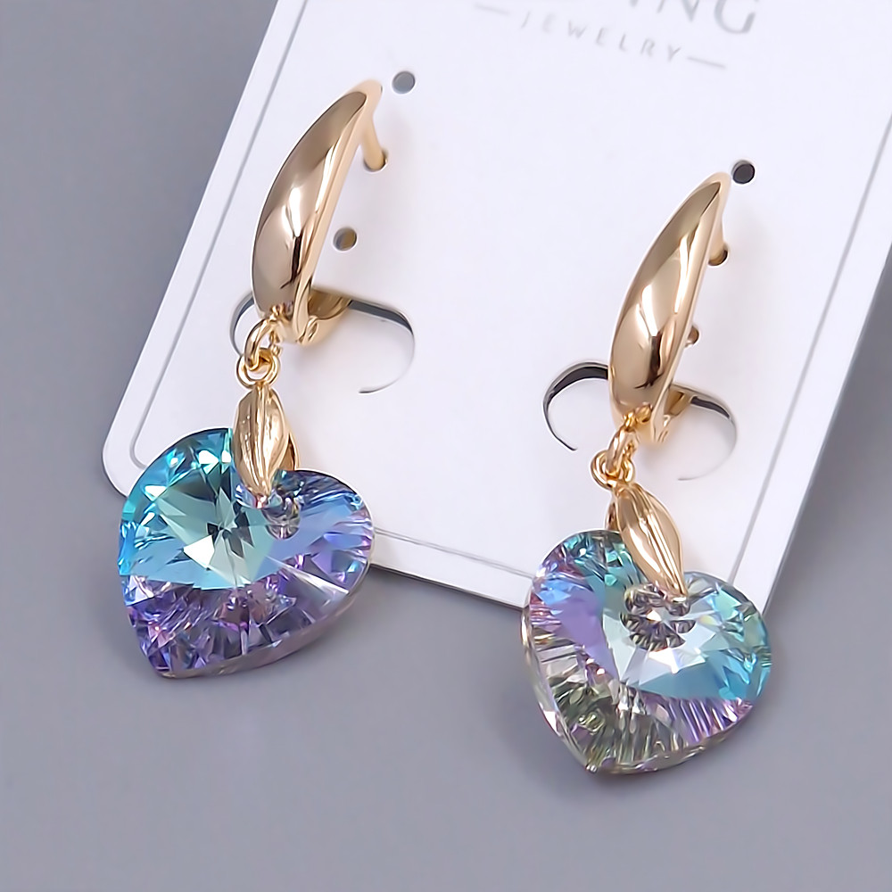 Сережки XР. Позолота 18К. Камені: Swarovski. Довжина: 39 мм. Ширина: 14 мм.
