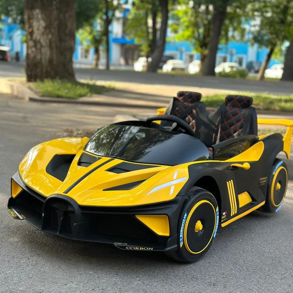 Дитячий двомісний електромобіль Bugatti Bolide (жовтий колір) 2×12V, 4×45W, EVA колеса, пульт, музика, Bluetooth, фото 1