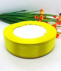 Атласна стрічка з люриксом. 2см. Ціна за 1м. Колір жовтий.