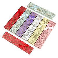 Коробочка прямокутна картонна з бантом і візерунками мікс кольорів під прикраси розмір 21х4,5х2 см 12 штук