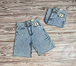 Жіночі джинсові блакитні рвані шорти
