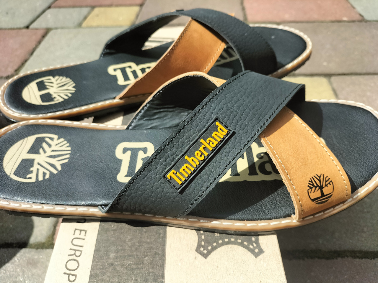Круті шльопанці чоловічі Timberland чорно рижі шкіра