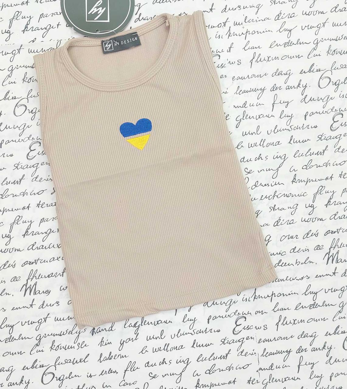 Топ в рубчик на дівчинку р 6-10 років, юежевий. з нашивкою