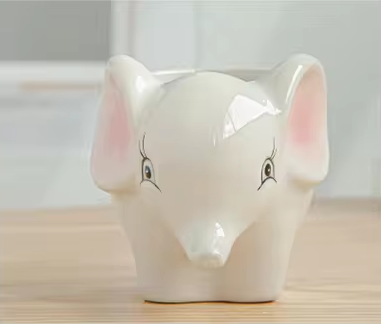 Керамічне кашпо у формі слоненяти