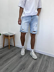 Чоловічі блакитні джинсові шорти з потертостями та дірками