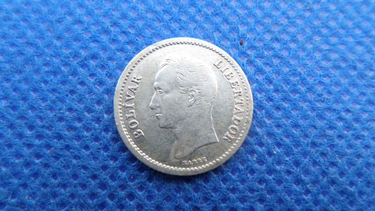 Венесуела ≥ Республіка Венесуела 25 сертимо, 1945 Срібло 0.835, 1.25g, ø 16 mm No1988