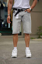 Чоловічі світло-сірі джинсові шорти з потертостями