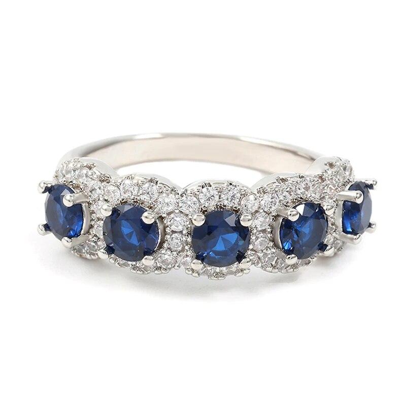 Жіноча сапфірова каблучка з безліччю синіх і білих каменів розмір 17.5, фото 1