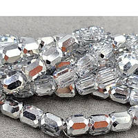 Бусины стекло цилиндр 7,5*8,5 мм  цена указана за 15  штук,/ цвет прозрачный серебряный бок