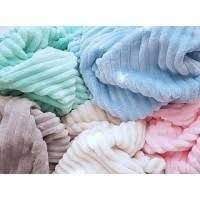 Пледи та покривала