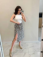 Трендовая летняя женская юбка миди полуприлегающая на высокой посадке с разрезом на ноге