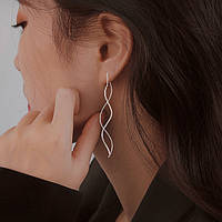 Довгі хвилясті жіночі сережки