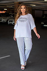 Жіночий прогулянковий літний костюм із штапелю: кофточка та штани, напівбатал та батал