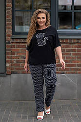 Жіночий прогулянковий літний костюм із штапелю: кофточка та штани, напівбатал та батал