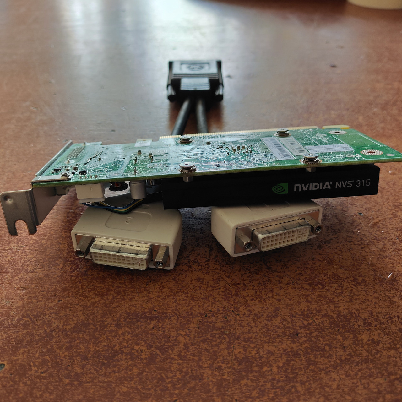 Відеокарта Nvidia GeForce Quadro NVS 315 1Gb DDR3 64 c перехідником на 2 x DVI низький профіль