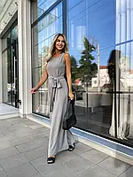 Жіночий літній комбінезони сірого кольору з широкими брюками з креп-жатки