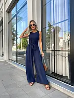 Синій жіночий комбінезон з легкої креп-жатки з широкими брюками та поясом