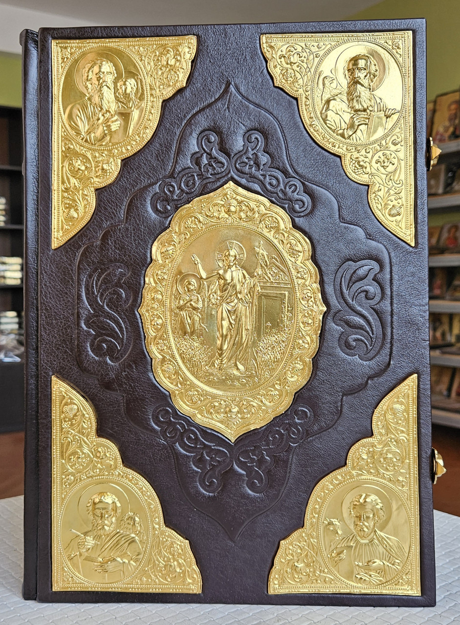 Книга Апракос Євангелія напрестольна українська мова, накладки позолота ,оклад шкіра, 2 застібки,розмір 23*33