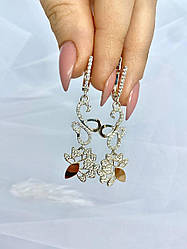 Сережки з підвісом і фіанітами срібло з золотом Жіноча слабкість