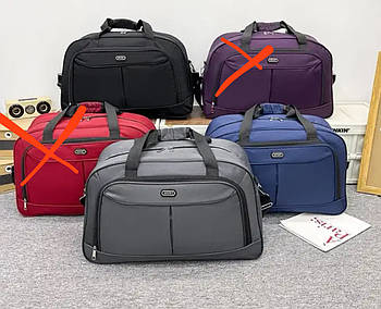 Сумка спортивна дорожня 38*60 см на блискавці з довгим ремінцем в різних кольорах Zhenya